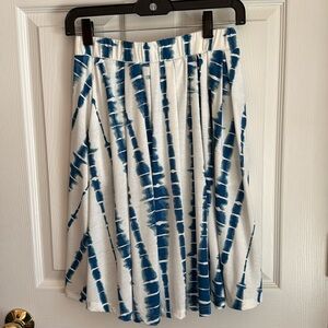 Never worn pleated skirt with pockets